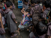 Kids are goning to school. Dhapa, Kolkata, India. September 11, 2015.  *** Go to http://nurphoto.com/en/reportages/51754 to see more **** (