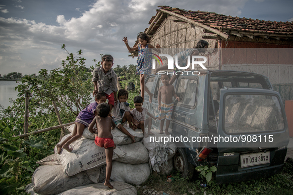 Kids are playing at Dhapa, Kolkata, India. September 18, 2015.  *** Go to http://nurphoto.com/en/reportages/51754 to see more **** 