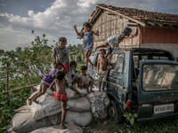 Kids are playing at Dhapa, Kolkata, India. September 18, 2015.  *** Go to http://nurphoto.com/en/reportages/51754 to see more **** (