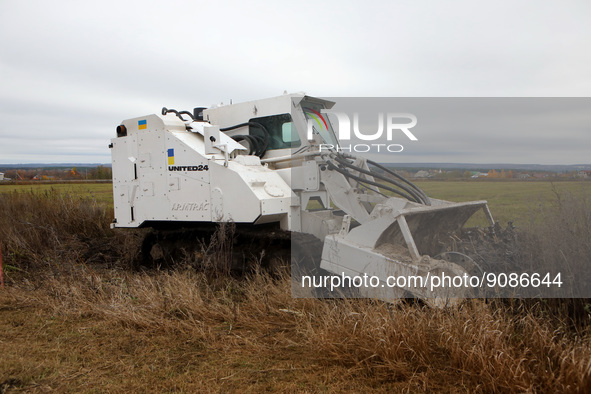 KHARKIV REGION, UKRAINE - OCTOBER 27, 2022 - An Armtrac 400 mine clearance vehicle purchased with donations made through the UNITED24 platfo...