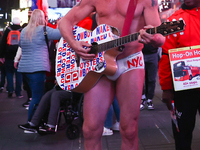 Robert John Burck, the Naked Cowboy, performs on Times Square in New York City, United States on October 22, 2022. (