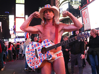 Robert John Burck, the Naked Cowboy, poses for a photo on Times Square in New York City, United States on October 22, 2022. (