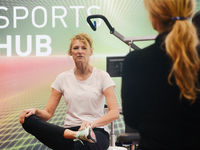 Heike Henkel, an Olympic champion, teaches exercise during the opening day of Medica 2022, a medical technology and health care exhibition i...