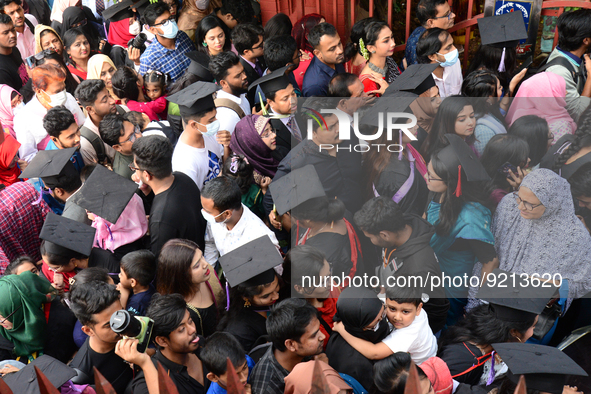 A group of graduates gather to expressing their delight of the Curzon hall at university area, on the 53th convocation of the students of Dh...