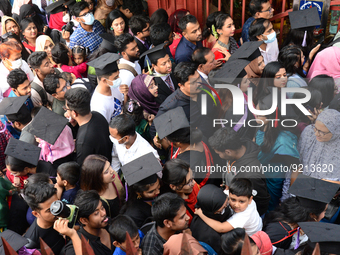 A group of graduates gather to expressing their delight of the Curzon hall at university area, on the 53th convocation of the students of Dh...