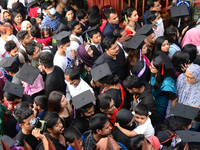 A group of graduates gather to expressing their delight of the Curzon hall at university area, on the 53th convocation of the students of Dh...