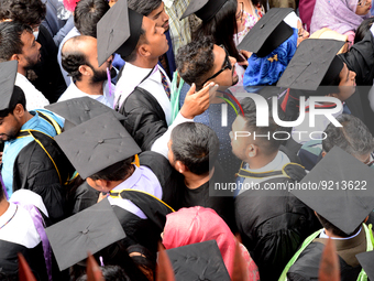 A group of graduates gather to expressing their delight of the Curzon hall at university area, on the 53th convocation of the students of Dh...