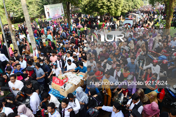 A group of graduates gather to expressing their delight of the Curzon hall at university area, on the 53th convocation of the students of Dh...