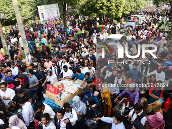 A group of graduates gather to expressing their delight of the Curzon hall at university area, on the 53th convocation of the students of Dh...