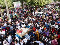 A group of graduates gather to expressing their delight of the Curzon hall at university area, on the 53th convocation of the students of Dh...