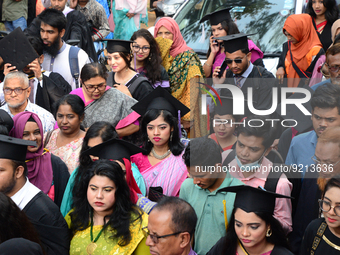 A group of graduates gather to expressing their delight of the Curzon hall at university area, on the 53th convocation of the students of Dh...