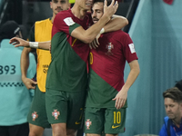 Cristiano Ronaldo Centre-Forward of Portugal celebrates with Bruno Fernandes Attacking Midfield of Portugal and Manchester United after scor...