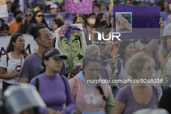 Mothers of victims of femicides, relatives of disappeared persons and various feminist collectives march from the Angel of Independence to t...