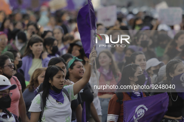 Mothers of victims of femicides, relatives of disappeared persons and various feminist collectives march from the Angel of Independence to t...