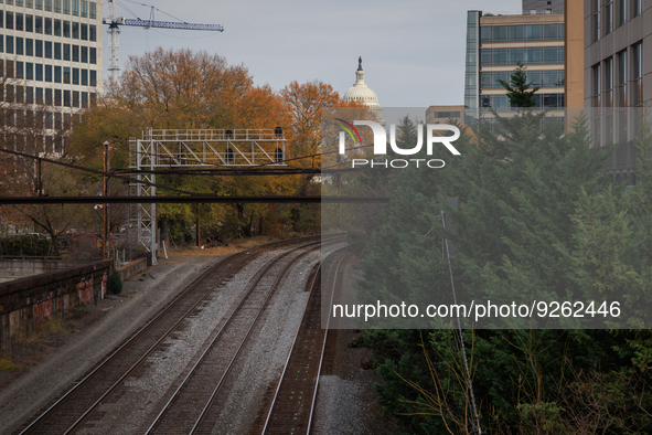 The U.S. Capitol is seen beyond railway tracks in Washington, D.C. on November 29, 2022 as Congress prepares to act to avoid a potential nat...