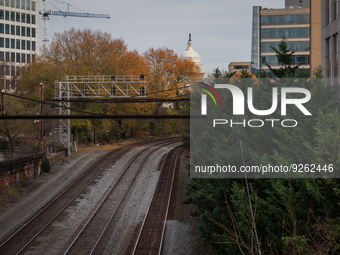 The U.S. Capitol is seen beyond railway tracks in Washington, D.C. on November 29, 2022 as Congress prepares to act to avoid a potential nat...