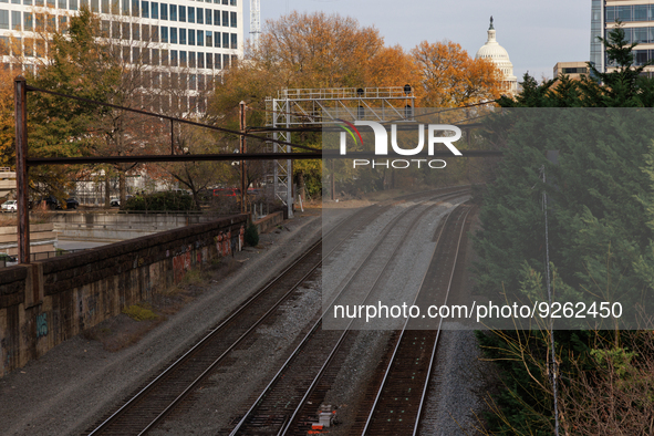 The U.S. Capitol is seen beyond railway tracks in Washington, D.C. on November 29, 2022 as Congress prepares to act to avoid a potential nat...