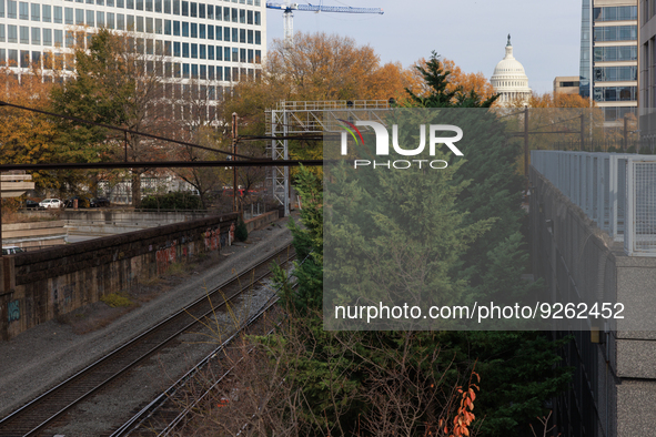 The U.S. Capitol is seen beyond railway tracks in Washington, D.C. on November 29, 2022 as Congress prepares to act to avoid a potential nat...