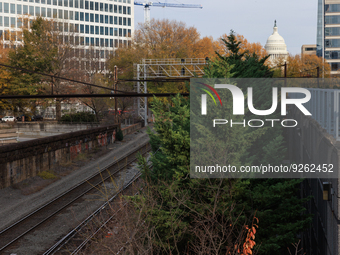 The U.S. Capitol is seen beyond railway tracks in Washington, D.C. on November 29, 2022 as Congress prepares to act to avoid a potential nat...