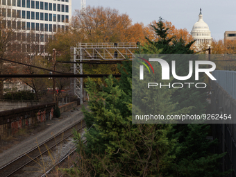 The U.S. Capitol is seen beyond railway tracks in Washington, D.C. on November 29, 2022 as Congress prepares to act to avoid a potential nat...