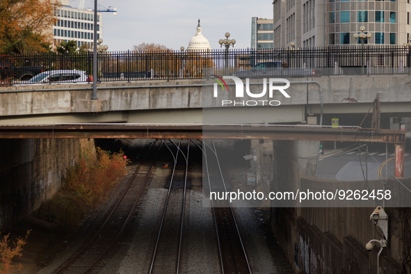 The U.S. Capitol is seen beyond railway tracks in Washington, D.C. on November 29, 2022 as Congress prepares to act to avoid a potential nat...