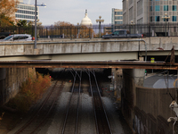 The U.S. Capitol is seen beyond railway tracks in Washington, D.C. on November 29, 2022 as Congress prepares to act to avoid a potential nat...