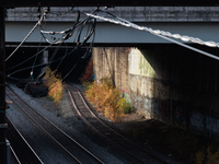 Sunlight shines on railway tracks in Washington, D.C. on November 29, 2022 as Congress prepares to act to avoid a potential nationwide labor...