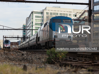 A commuter train approaches the Virginia Railway Express L'Enfant Station in Washington, D.C. on November 29, 2022 as Congress prepares to a...