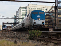 A commuter train approaches the Virginia Railway Express L'Enfant Station in Washington, D.C. on November 29, 2022 as Congress prepares to a...