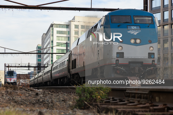 A commuter train approaches the Virginia Railway Express L'Enfant Station in Washington, D.C. on November 29, 2022 as Congress prepares to a...