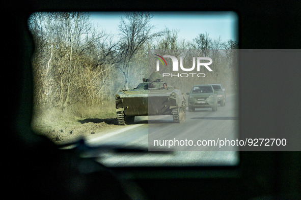 Tank near the frontlines in Donbass region viewed from an armoured vehicle of the ukrainian army forces patrolling ithe area. 