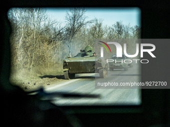 Tank near the frontlines in Donbass region viewed from an armoured vehicle of the ukrainian army forces patrolling ithe area. (