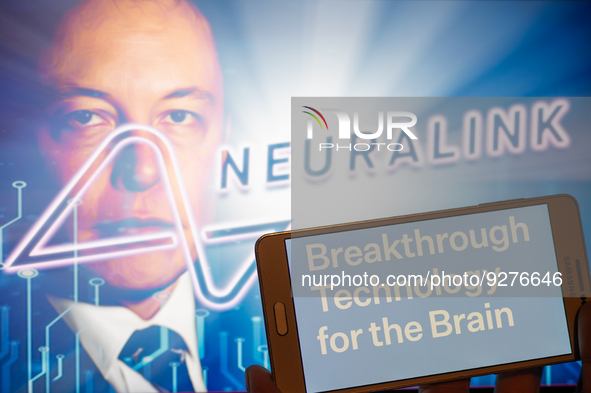 Neuralink logo displayed on mobil with founder Elon Musk seen on screen in the background. Neuralink Corporation is a neurotechnology compan...