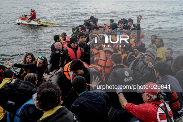 Migrants approach the coast of the northeastern Greek island of Lesbos on Thursday, Nov. 26, 2015. About 5,000 migrants are reaching Europe...