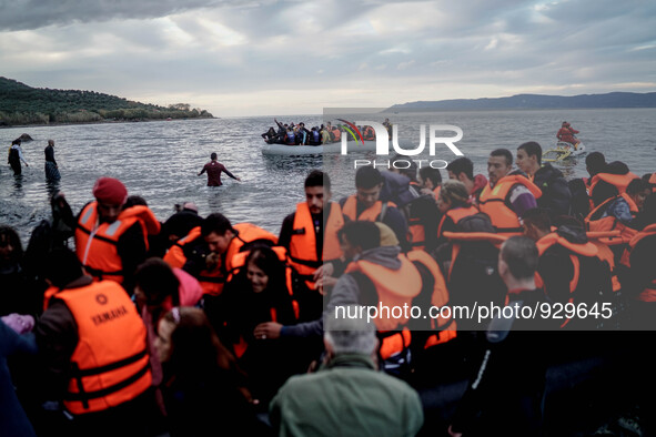 Migrants approach the coast of the northeastern Greek island of Lesbos on Thursday, Nov. 26, 2015. About 5,000 migrants are reaching Europe...