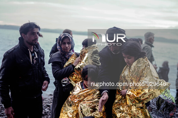 Migrants approach the coast of the northeastern Greek island of Lesbos on Thursday, Nov. 26, 2015. About 5,000 migrants are reaching Europe...