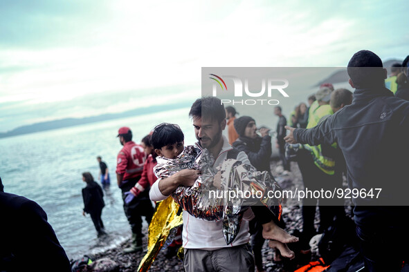 Migrants approach the coast of the northeastern Greek island of Lesbos on Thursday, Nov. 26, 2015. About 5,000 migrants are reaching Europe...