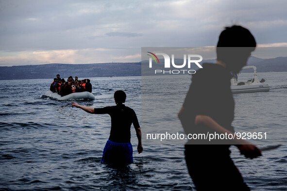 Migrants approach the coast of the northeastern Greek island of Lesbos on Thursday, Nov. 26, 2015. About 5,000 migrants are reaching Europe...