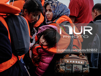 Migrants approach the coast of the northeastern Greek island of Lesbos on Thursday, Nov. 26, 2015. About 5,000 migrants are reaching Europe...