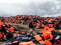 Migrants approach the coast of the northeastern Greek island of Lesbos on Thursday, Nov. 27, 2015. About 5,000 migrants are reaching Europe...