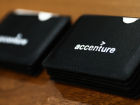 Accenture logo is seen on a company gadget during the job fair, organized mainly for Ukrainian refugees, in Krakow, Poland on December 8, 20...