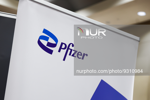 Pfizer logo is seen during the job fair, organized mainly for Ukrainian refugees, in Krakow, Poland on December 8, 2022. 