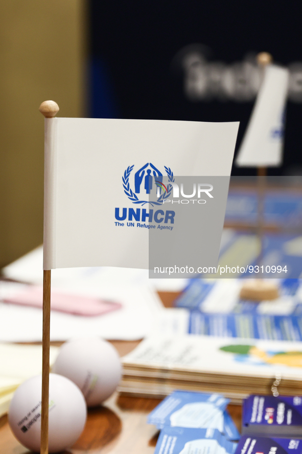 UNHCR logo is seen on a flag during the job fair, organized mainly for Ukrainian refugees, in Krakow, Poland on December 8, 2022. 