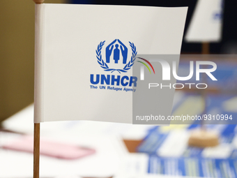 UNHCR logo is seen on a flag during the job fair, organized mainly for Ukrainian refugees, in Krakow, Poland on December 8, 2022. (