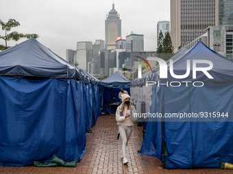 A women leaving a Covid-19 community testing centre on December 14, 2022 in Hong Kong, China. The Hong Kong Government announced yesterday a...