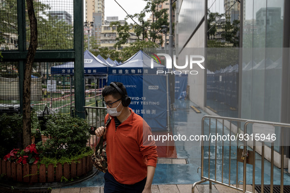 A man leaving a Covid-19 community testing centre on December 14, 2022 in Hong Kong, China. The Hong Kong Government announced yesterday at...