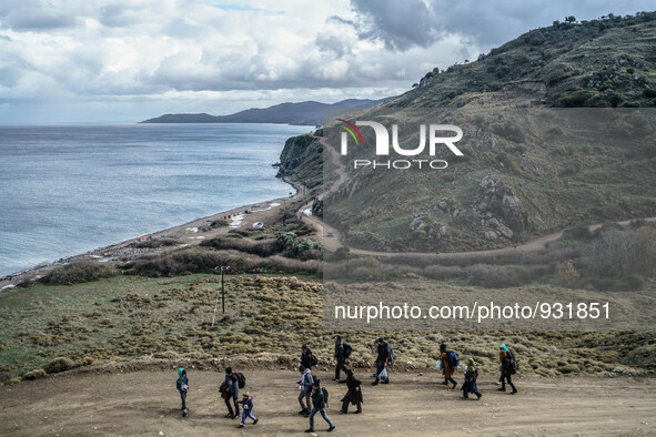  Migrants approach the coast of the northeastern Greek island of Lesbos on Thursday, Nov. 28, 2015. About 5,000 migrants are reaching Europe...