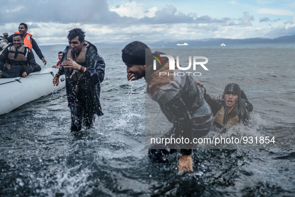  Migrants approach the coast of the northeastern Greek island of Lesbos on Thursday, Nov. 28, 2015. About 5,000 migrants are reaching Europe...