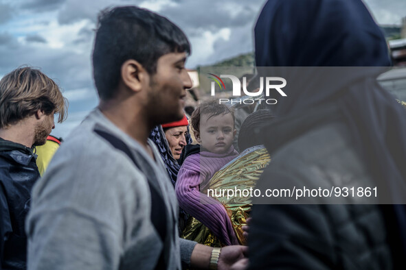  Migrants approach the coast of the northeastern Greek island of Lesbos on Thursday, Nov. 28, 2015. About 5,000 migrants are reaching Europe...