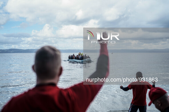  Migrants approach the coast of the northeastern Greek island of Lesbos on Thursday, Nov. 28, 2015. About 5,000 migrants are reaching Europe...